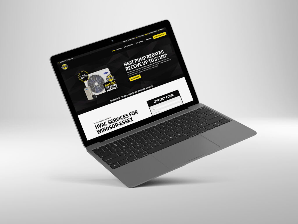 a laptop with an image of the absolute comfort website