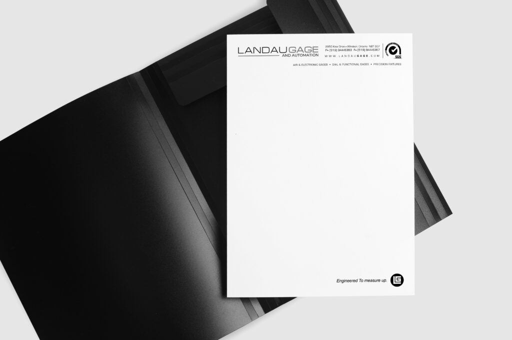 LAndau gage letterhead and a duo tang