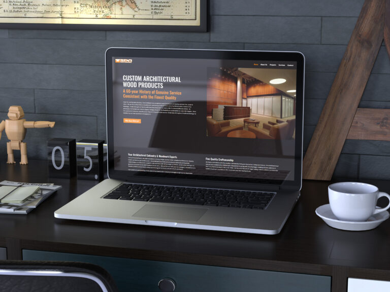 laptop on desk with trend millwork site open on it